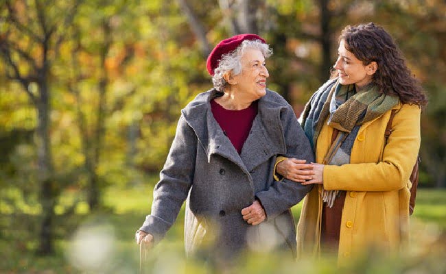 Caregiver Out for a Walk with Client