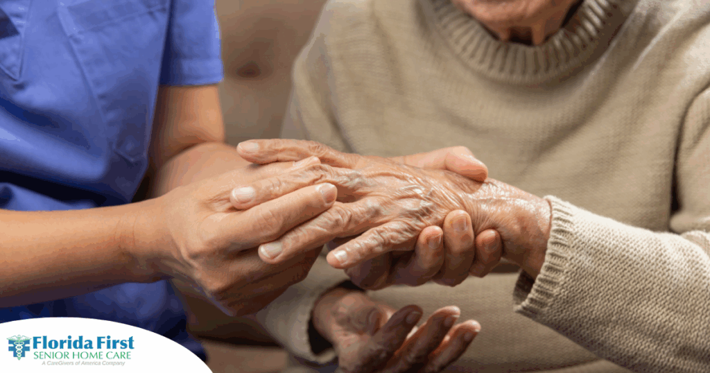 A nurse check where a patient’s hand is hurting in order to help with pain management.