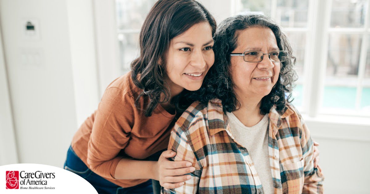 A senior couple looks at a computer, representing older adults looking for payment options for home health care.