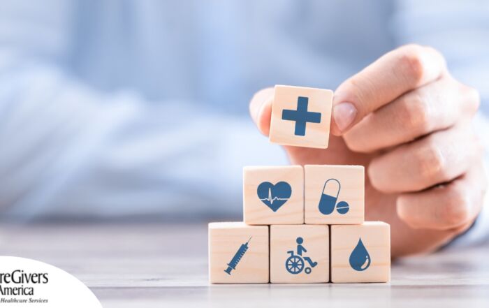 A stack of block with different health related icons represents health insurance which can help with home health care.