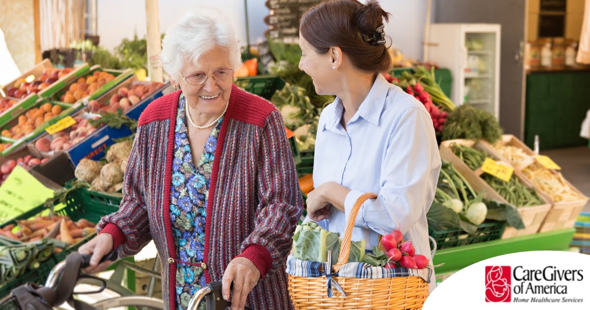 A caregiver shops for groceries with an older adult, representing shopping for a diabetes-friendly diet.