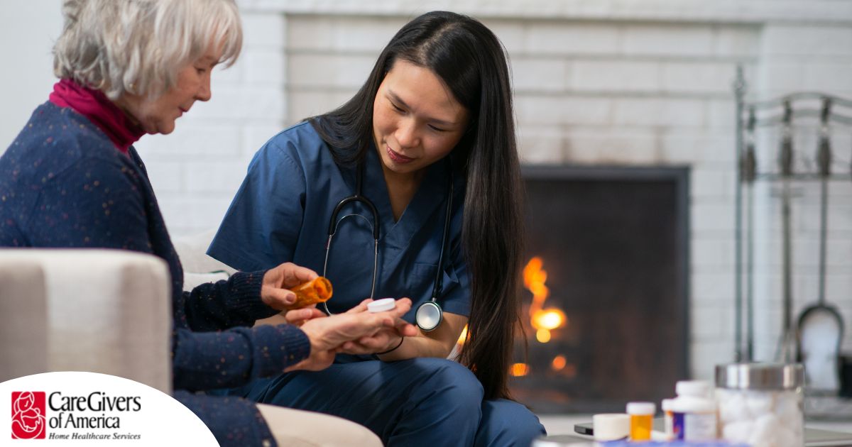 A nurse helps a patient at home with her medications, representing how home health nurses can help with disease management.