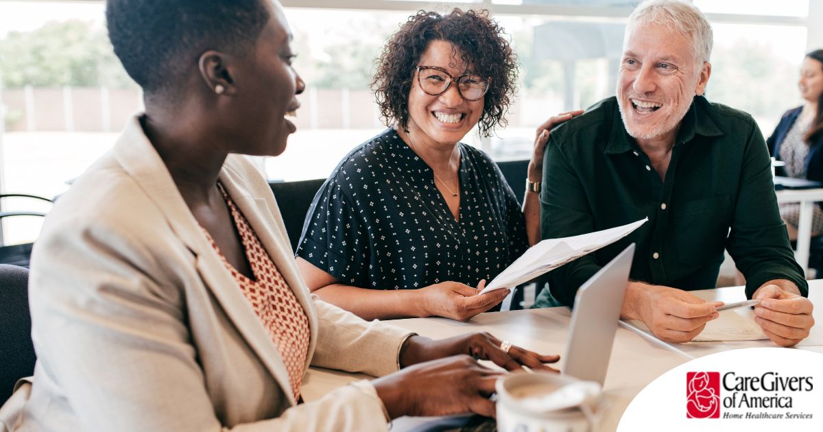 A couple talks with and advisor, representing the type of preparation that is crucial for successful senior care planning.