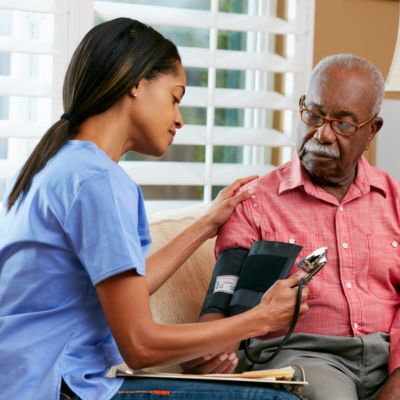 Personal Care in Margate (2) caregiver assisting senior with health check during personal care in Margate, FL